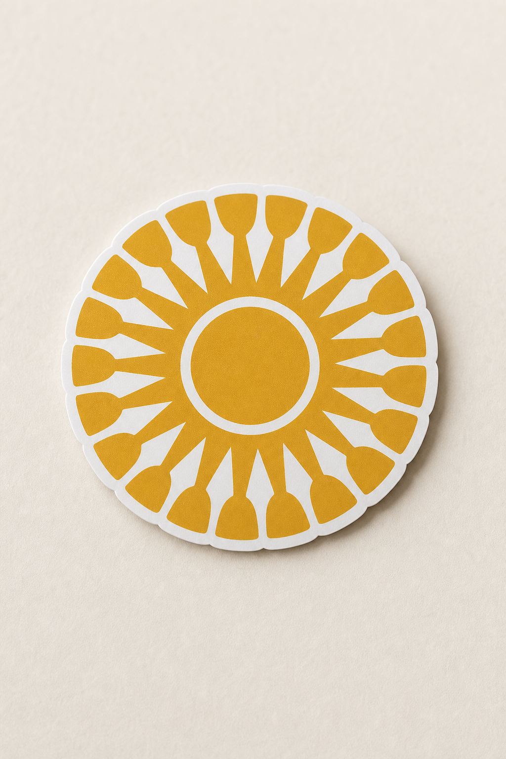 Die-cut vinyl sticker of the AoIK sun emblem