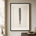 Framed museum print of a woven braid with the words Jin Jiyan Azadî