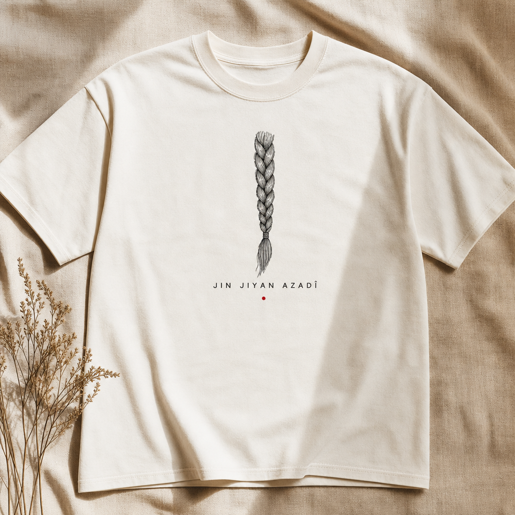 Bone heavyweight tee with a single braid line-art and the words Jin Jiyan Azadî
