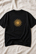 Heavyweight black t-shirt with a golden Zagros Sun chest print